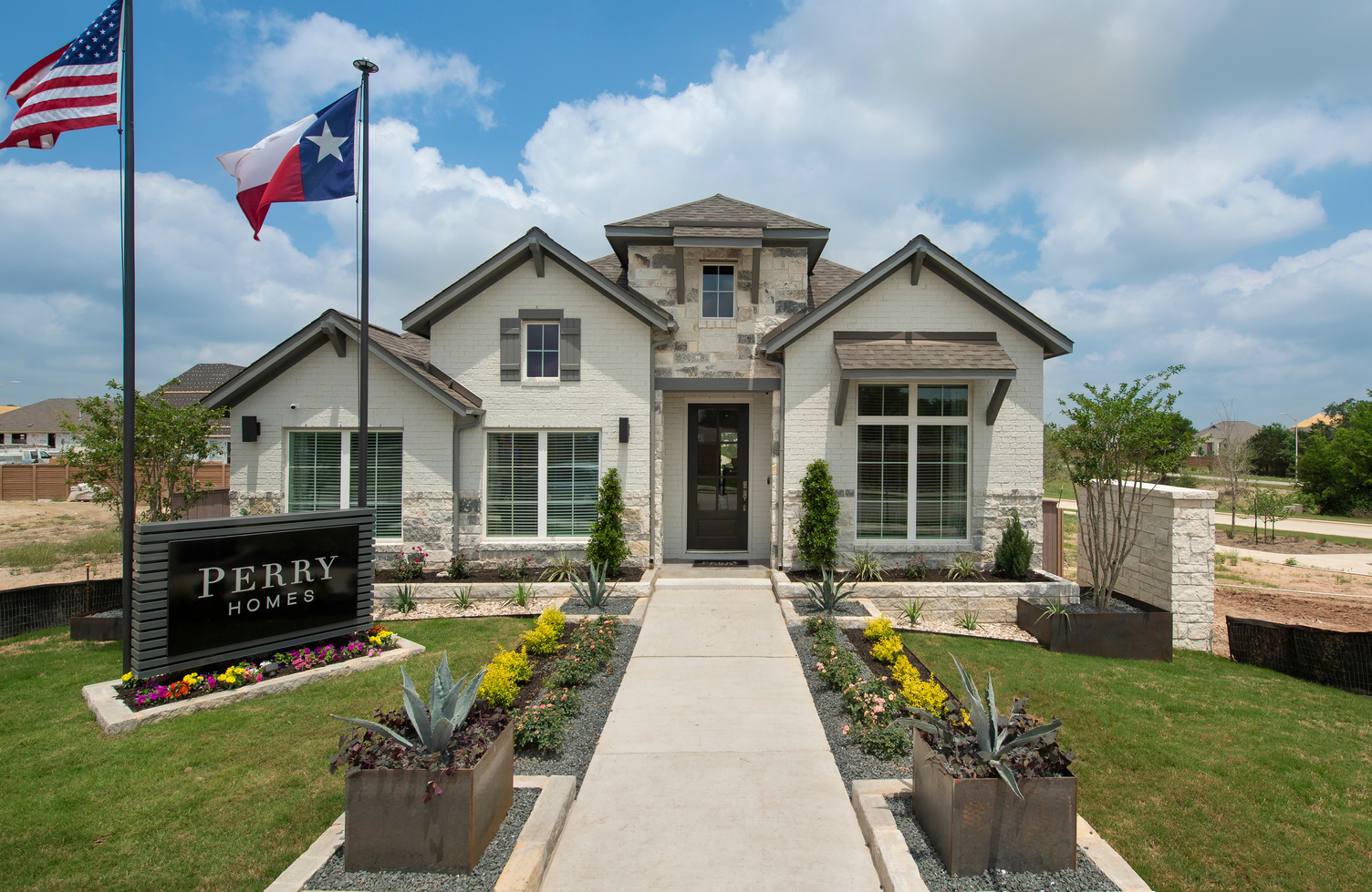Perry Homes Anthem brick and stone model home